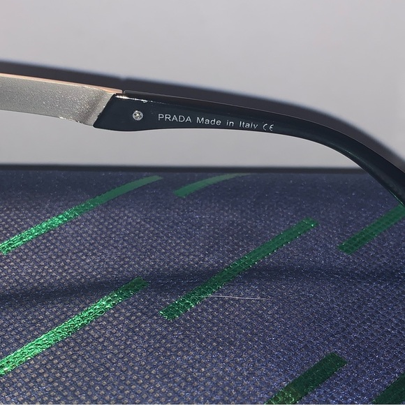 Prada unisex sunglasses, looks brand new. Sleek black with signature red stripe. - Picture 5 of 5